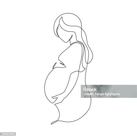 Terhes nő iszik teát